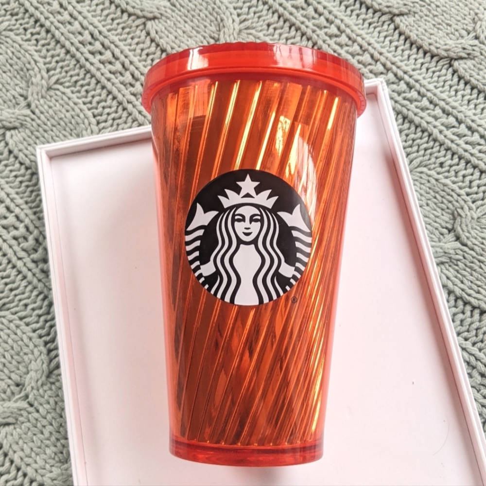 Orange swirl 16 oz Starbucks tumbler